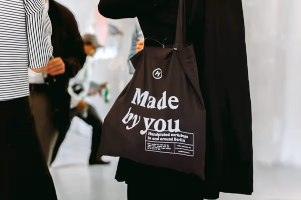 Impressions from opening party; a cotton bag.